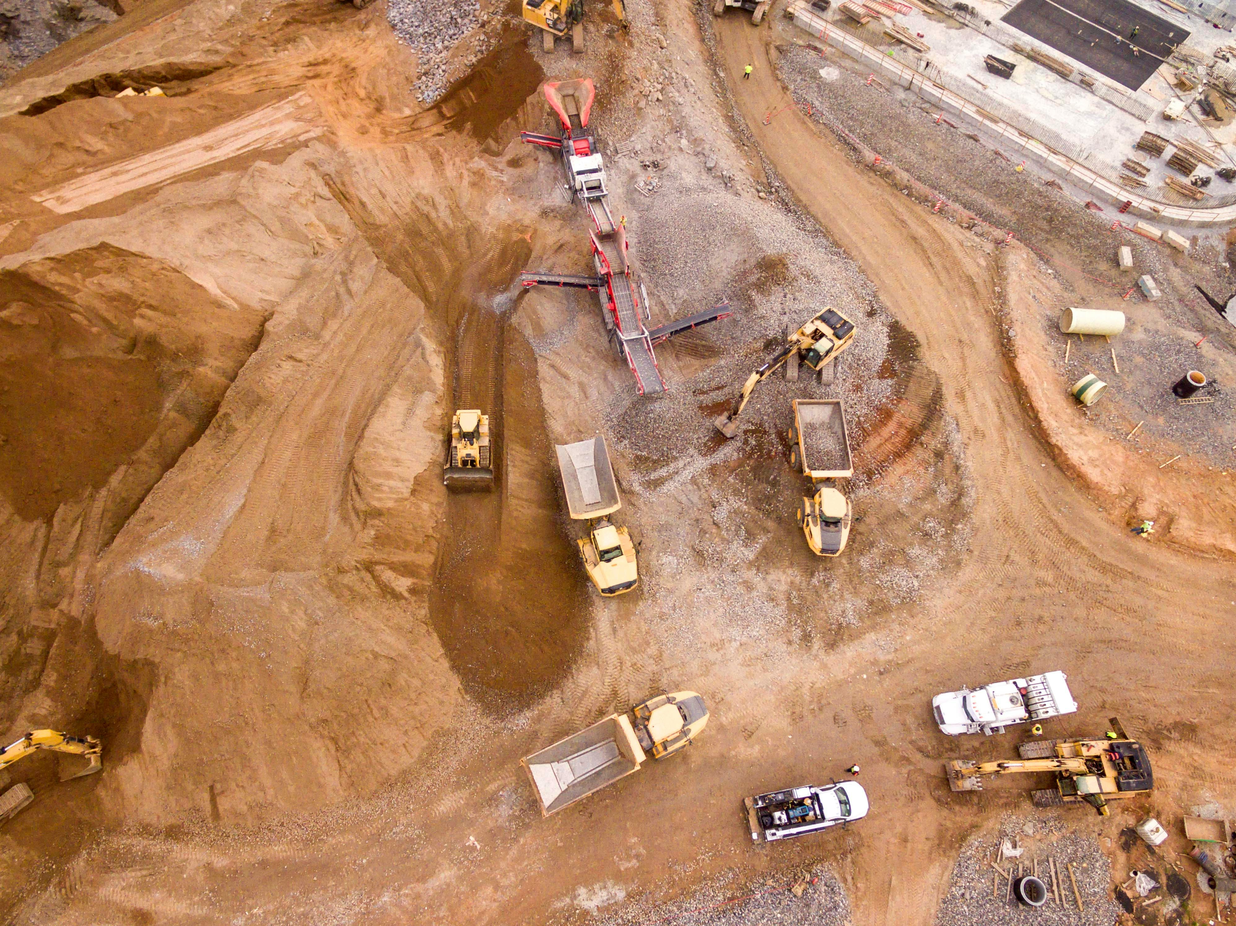 Mining Site with Trucks Top View